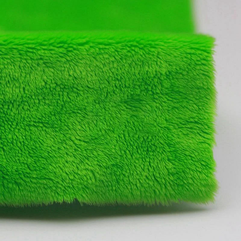 Close-up of Longon Craft’s Plush Minky Fabric by the Yard—a bright green, ultra-soft 5mm polyester with a fuzzy texture, perfect for baby blankets, plushies, and sewing crafts.