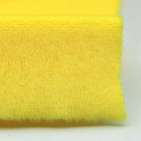 A close-up of Longon Craft's Plush Minky Fabric By The Yard shows its bright yellow, 5mm soft polyester texture—ideal for plushies, sewing, and baby blankets.