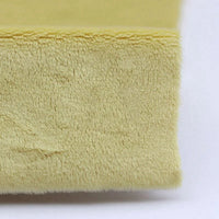 Close-up of Longon Craft’s Plush Minky Fabric by the Yard, a 5mm soft polyester material in solid yellow, featuring a textured, ultra-soft surface ideal for plushies and sewing crafts, shown against a plain white background.