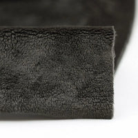 Close-up of Longon Craft Plush Minky Fabric by the yard in dark gray—5mm ultra-soft polyester with a dense, fuzzy texture, ideal for plushies, baby blankets, and sewing crafts.