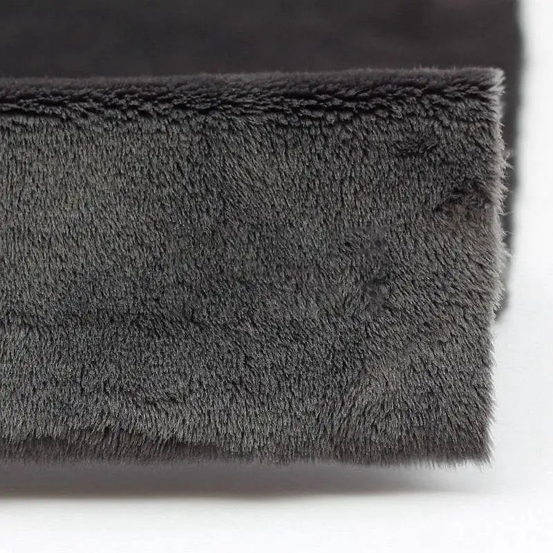 Close-up of Longon Craft's Plush Minky Fabric By The Yard, a 5mm soft polyester minky material in solid dark gray, perfect for plushies, sewing, and crafts.