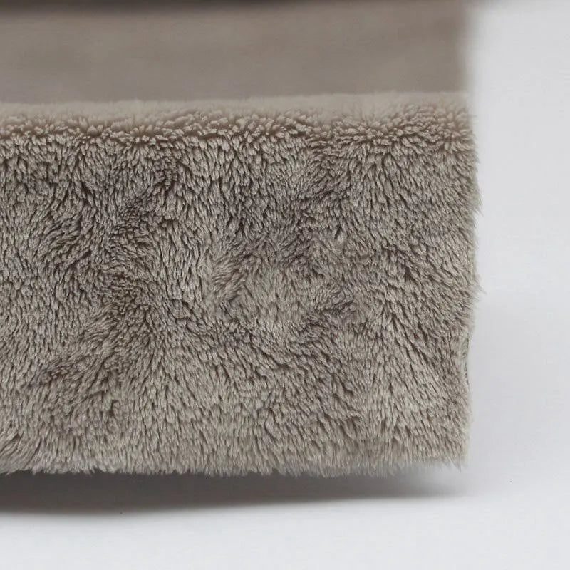 Close-up of Longon Craft Plush Minky Fabric by the yard—a 5mm soft polyester material in solid color—showing its cozy texture and substantial thickness for plushies, sewing, and crafts.