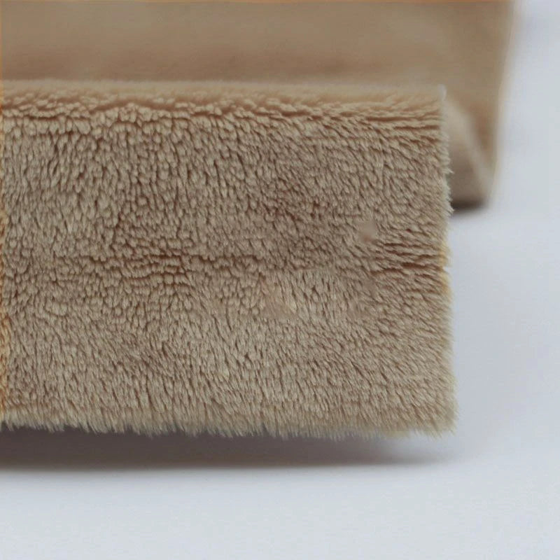Close-up of Longon Craft's Plush Minky Fabric by the Yard, featuring 5mm soft polyester in a solid beige color, highlighting its dense fibers and plush texture—ideal for plushies, sewing, and crafts.