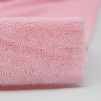 A close-up of Longon Craft's Plush Minky Fabric By The Yard in pink, highlighting its ultra-soft 5mm polyester texture—perfect solid color minky material for plushies, sewing, and crafts.