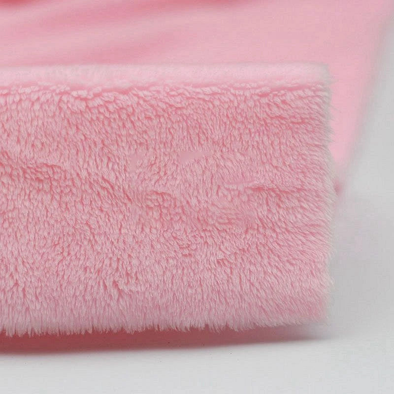 A close-up of Longon Craft's Plush Minky Fabric By The Yard in pink, highlighting its ultra-soft 5mm polyester texture—perfect solid color minky material for plushies, sewing, and crafts.