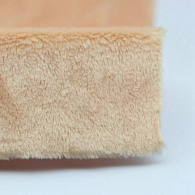 Close-up of Longon Craft Plush Minky Fabric by the Yard, a beige, 5mm ultra-soft polyester material with a fuzzy texture—ideal solid color minky fabric for plushies, sewing, and craft projects.