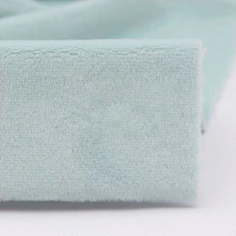 Close-up of Longon Craft Plush Minky Fabric by the Yard in light blue, highlighting its soft 5mm polyester texture—ideal for plushies and sewing crafts, similar to fabric used in baby blankets.