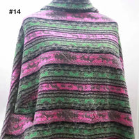 A person wears a poncho-style garment made from Longon Craft Printed Polar Fleece Fabric By The Yard, featuring a polyester ethnic leopard pattern in pink, green, gray, and black. Image marked “#14” appears in the top left corner.