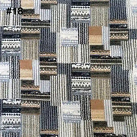 Longon Craft’s Printed Polar Fleece Fabric By The Yard shows an ethnic leopard pattern in beige, gray, black, and brown. Rectangular and striped shapes appear throughout, with the number #18 in the top left corner.