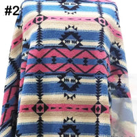 A Longon Craft Printed Polar Fleece Fabric by the yard features an ethnic leopard pattern in polyester, ideal for DIY craft or sewing projects. The number 2 appears in the top left corner.