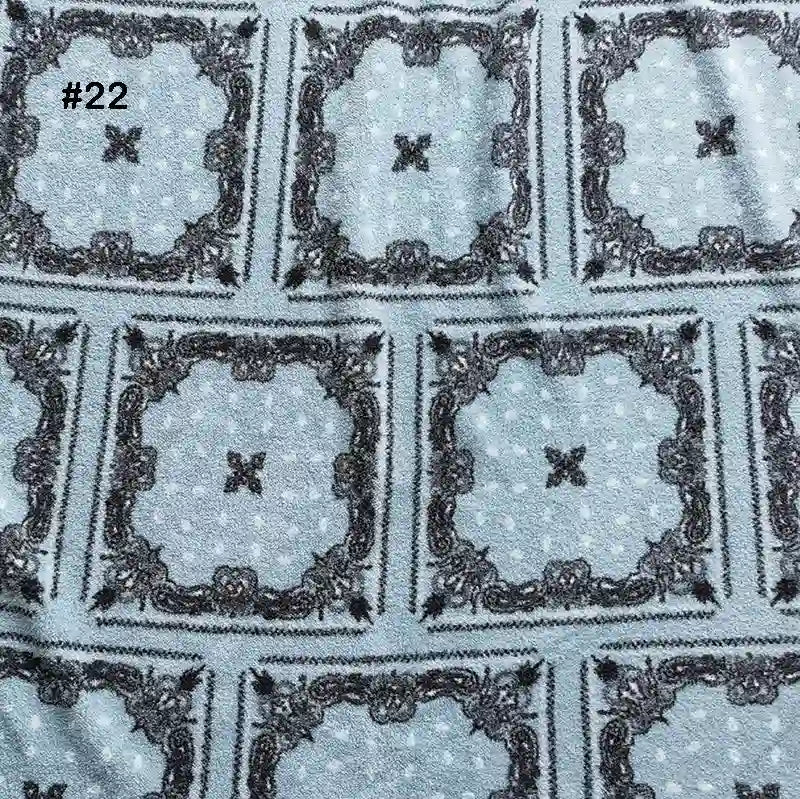 Longon Craft’s Printed Polar Fleece Fabric by the Yard features a black and white ethnic leopard pattern on soft blue polyester—perfect for cozy DIY crafts and sewing projects.