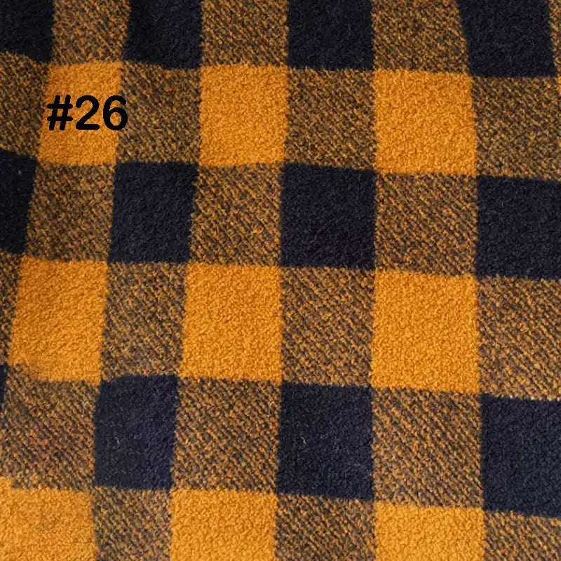 A Longon Craft Printed Polar Fleece Fabric features an ethnic leopard pattern in mustard yellow and dark navy blue, labeled #26 in black text at the top left. Perfect for DIY crafts and sewing projects.