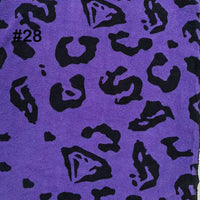 Longon Craft’s Printed Polar Fleece Fabric by the yard is polyester with an ethnic leopard print pattern, perfect for DIY crafts and sewing. The number #28 appears in black text in the upper left corner.