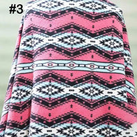 A close-up of Longon Craft Printed Polar Fleece Fabric by the yard features a pink, white, and black ethnic leopard pattern with zigzags and diamonds. Number 3 in black at the top left. Perfect for DIY crafts, sewing, and blankets.
