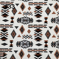 Longon Craft's Printed Polar Fleece Fabric By The Yard features an ethnic leopard pattern in black, brown, and orange on a white background, perfect for DIY crafts, sewing projects, and blankets. "#33" appears in the top left corner.