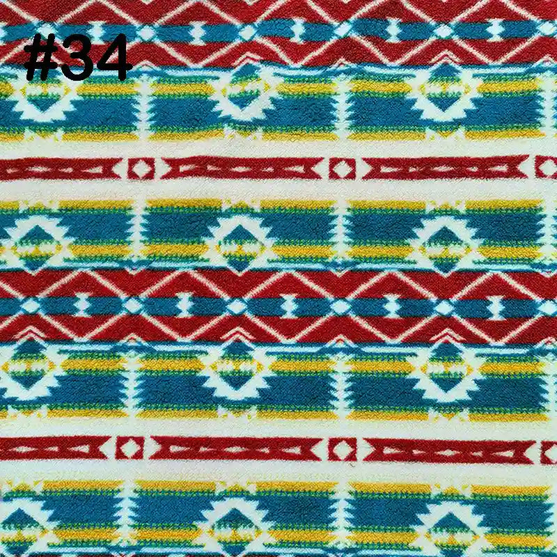 Longon Craft Printed Polar Fleece Fabric By The Yard features a colorful ethnic leopard pattern with red, green, yellow, and blue stripes, plus diamond and zigzag shapes. #34 is shown in black at the top left. Perfect for DIY craft and sewing projects.