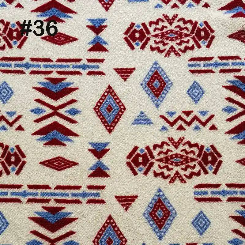 Longon Craft’s Printed Polar Fleece Fabric by the Yard features an ethnic leopard pattern in red and blue on cream. Ideal for DIY crafts and blankets. #36 is in the top left corner—quality polyester fleece material for sewing projects.