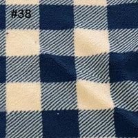A close-up of Longon Craft Printed Polar Fleece Fabric By The Yard shows a textured, ethnic leopard pattern in blue and cream. "#38" appears in black in the top left. Ideal polyester fleece for DIY crafts, sewing projects, and blankets.