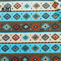 Longon Craft’s Printed Polar Fleece Fabric By The Yard features an ethnic leopard pattern in blue, brown, cream, orange, and black—ideal for DIY crafts and sewing projects. The number #40 appears in the top left corner.