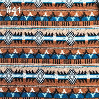 Longon Craft Printed Polar Fleece Fabric By The Yard features an ethnic leopard pattern in brown, blue, black, and white with horizontal stripes and diamond shapes. "#41" appears in white text at the top left. Ideal for DIY crafts and sewing projects.