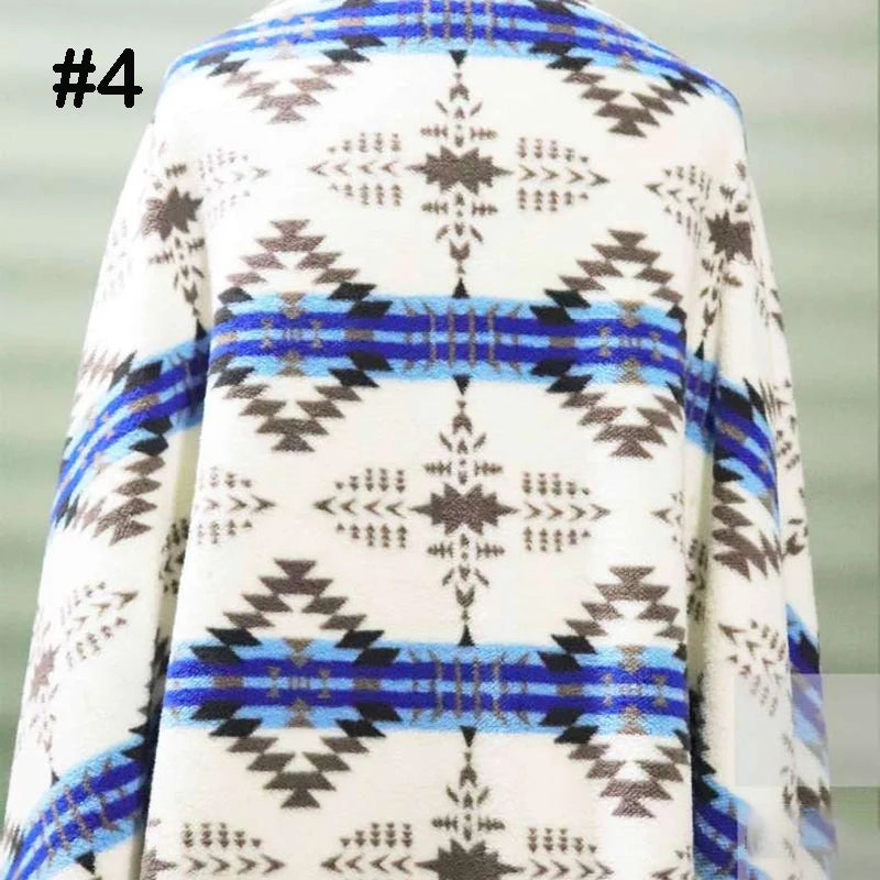 Longon Craft Printed Polar Fleece Fabric by the yard features an ethnic leopard pattern in brown, black, and blue on white polyester—ideal for DIY crafts and sewing projects.
