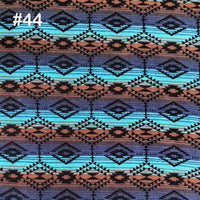 Longon Craft’s Printed Polar Fleece Fabric by the Yard features an ethnic leopard pattern in blue, black, and brown—ideal for DIY crafts and sewing. The white "#44" appears in the top left corner.