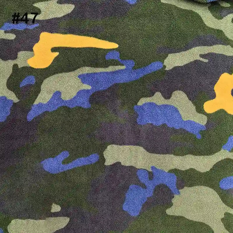 Longon Craft's Printed Polar Fleece Fabric By The Yard features an ethnic leopard pattern in green, brown, yellow, and blue on polyester fleece. The number #47 appears in black at the upper left for DIY craft sewing projects.