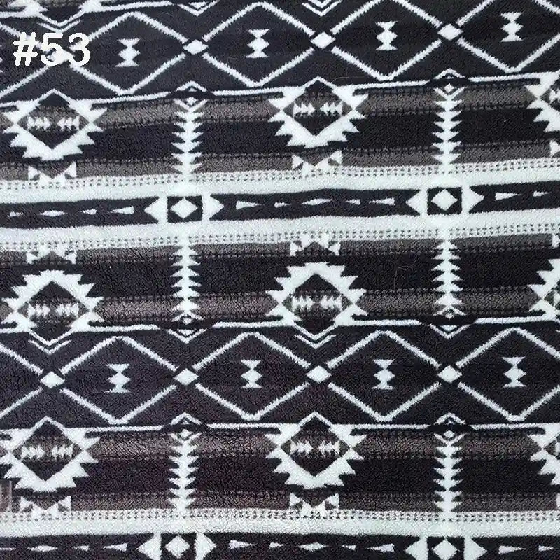 Longon Craft Printed Polar Fleece Fabric by the Yard features an ethnic leopard pattern on soft polyester. This cozy material is perfect for blankets, DIY crafts, or sewing projects.