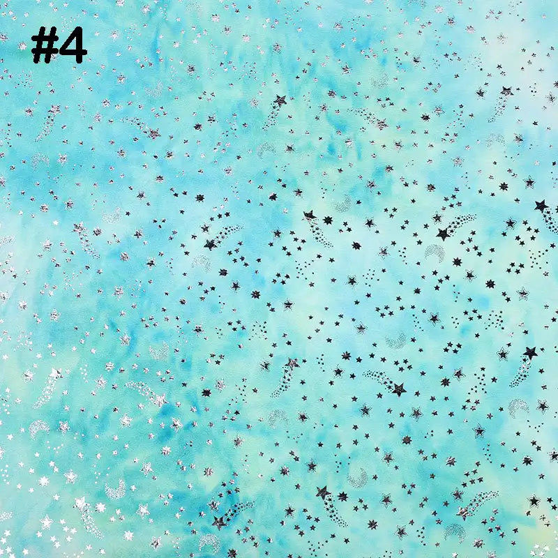 Featuring a vibrant tie-dye stars pattern in blue-green with silver and black accents, Longon Craft's Rainbow Minky Fabric by the yard is ideal for sewing baby blankets or plushies—perfect inspiration for your next craft project.