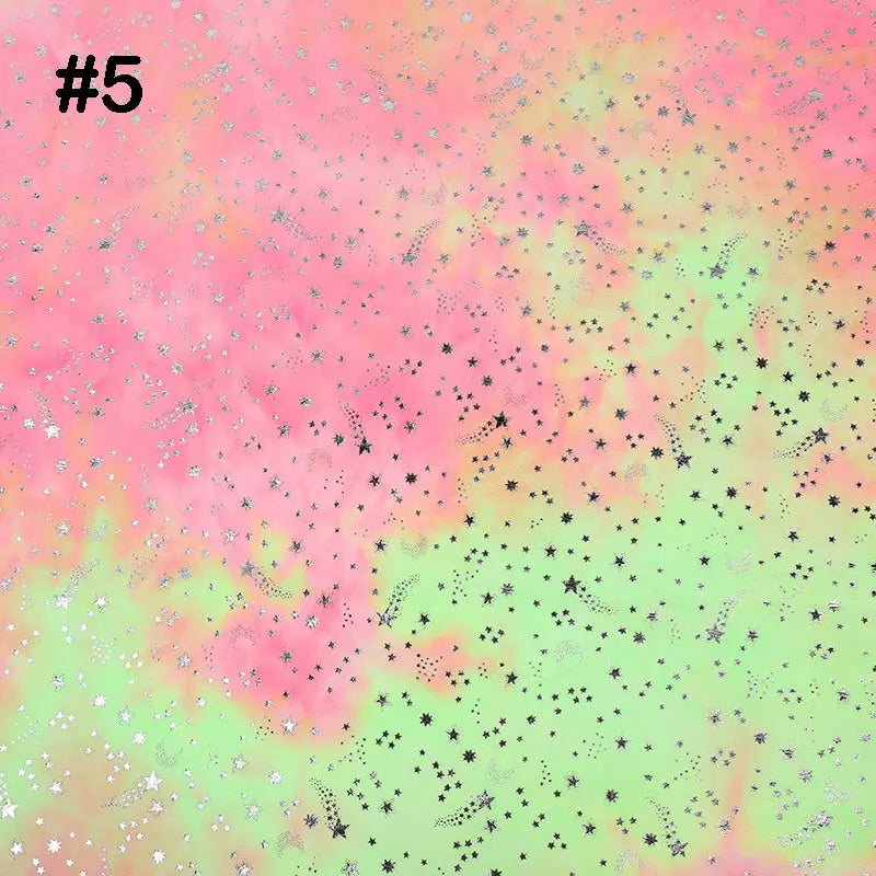 A vibrant background inspired by Longon Craft’s Rainbow Minky Fabric—featuring a colorful tie-dye star pattern in pink, green, and yellow with black and silver stars. The number 5 is displayed in the top left corner.