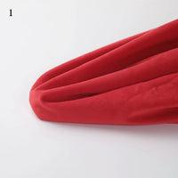 A close-up of red Soft Minky Fabric By The Yard from Longon Craft, 1mm plush material for DIY sewing and crafts, draped on a white surface with the number 1 in the top left corner.