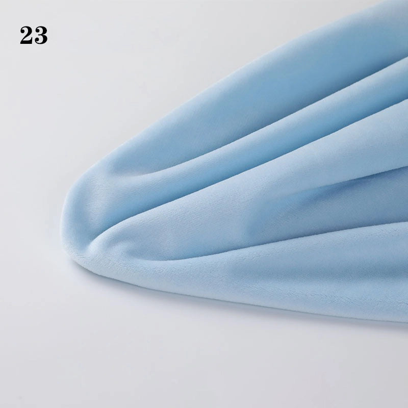 Longon Craft's Soft Minky Fabric By The Yard (1mm Minky Cuddle Doll Plushies Material) is shown in light blue on a white surface, with the number 23 in the upper left corner—perfect for DIY sewing and crafts.