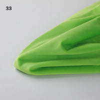 A piece of bright green Longon Craft Soft Minky Fabric By The Yard (1mm Minky Cuddle Doll Plushies Material) is displayed on a white surface, with the number 33 in the top left corner.