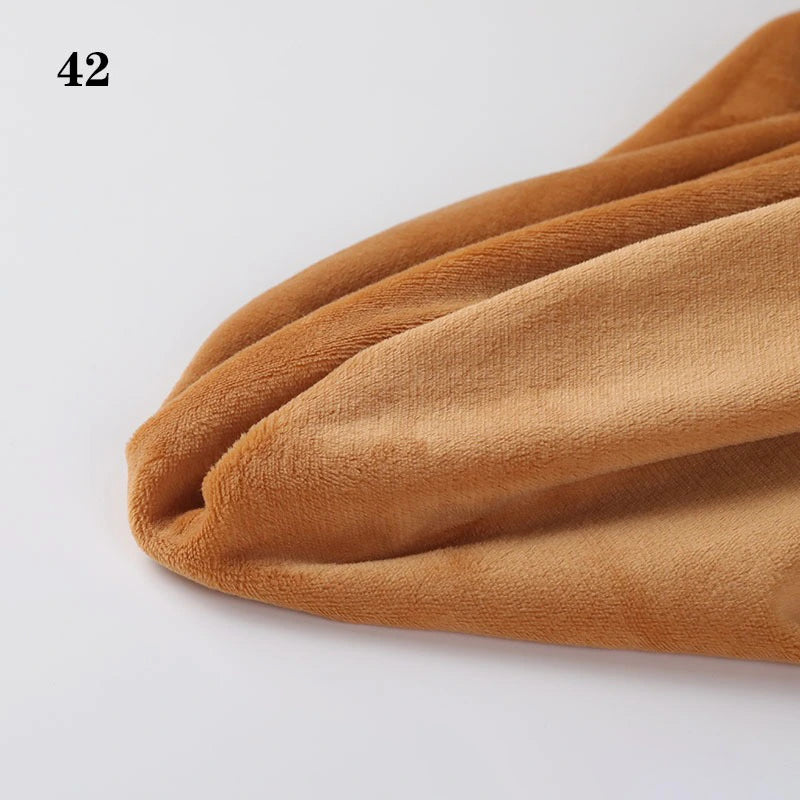 A piece of Longon Craft Soft Minky Fabric By The Yard (1mm Minky Cuddle Doll Plushies Material) in light brown is displayed on a white surface, with the number 42 printed in the top left corner.