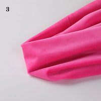 A close-up of Soft Minky Fabric by the yard from Longon Craft, in bright pink 1mm cuddle plush for DIY sewing or upholstery, neatly folded on a white surface with a number 3 in the top left corner.