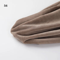 A close-up of Longon Craft Soft Minky Fabric By The Yard, a brownish-taupe 1mm plush material for DIY sewing and upholstery, draped with the number 56 in black at the top left corner.