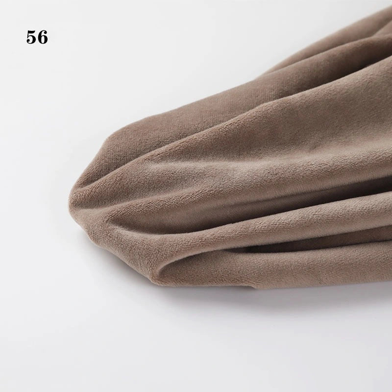 A close-up of Longon Craft Soft Minky Fabric By The Yard, a brownish-taupe 1mm plush material for DIY sewing and upholstery, draped with the number 56 in black at the top left corner.