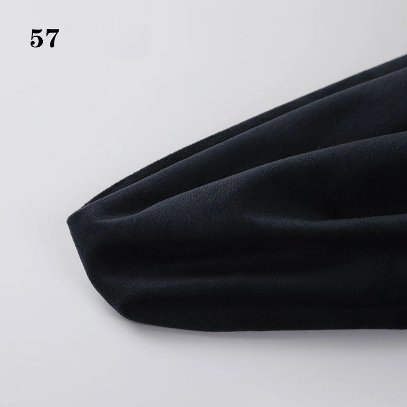 A close-up of Longon Craft’s Soft Minky Fabric By The Yard (1mm cuddle doll plushies material) in black, shown against a white background with the number 57 in the top left corner. Ideal for DIY sewing and upholstery projects.