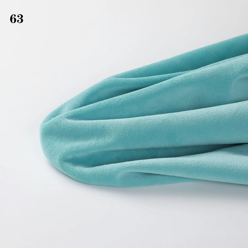A close-up of Soft Minky Fabric By The Yard from Longon Craft, labeled 63 in the top left corner; this 1mm plushies material is perfect for DIY sewing, crafts, and upholstery projects.