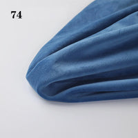 A close-up of Soft Minky Fabric By The Yard from Longon Craft, in soft blue with a seam, labeled “74” in black in the upper left corner—ideal 1mm cuddle material for plushies, DIY sewing, and upholstery projects.