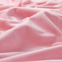 A close-up of Longon Craft’s Soft Minky Fabric by the Yard shows its gentle folds and smooth 1mm plush texture, ideal for DIY sewing, craft, upholstery, or doll plushies.
