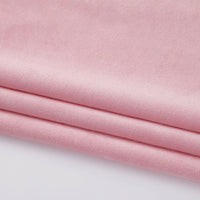 Close-up of Longon Craft Soft Minky Fabric by the Yard, a 1mm light pink plush material with a smooth texture, ideal for DIY sewing crafts and upholstery projects.