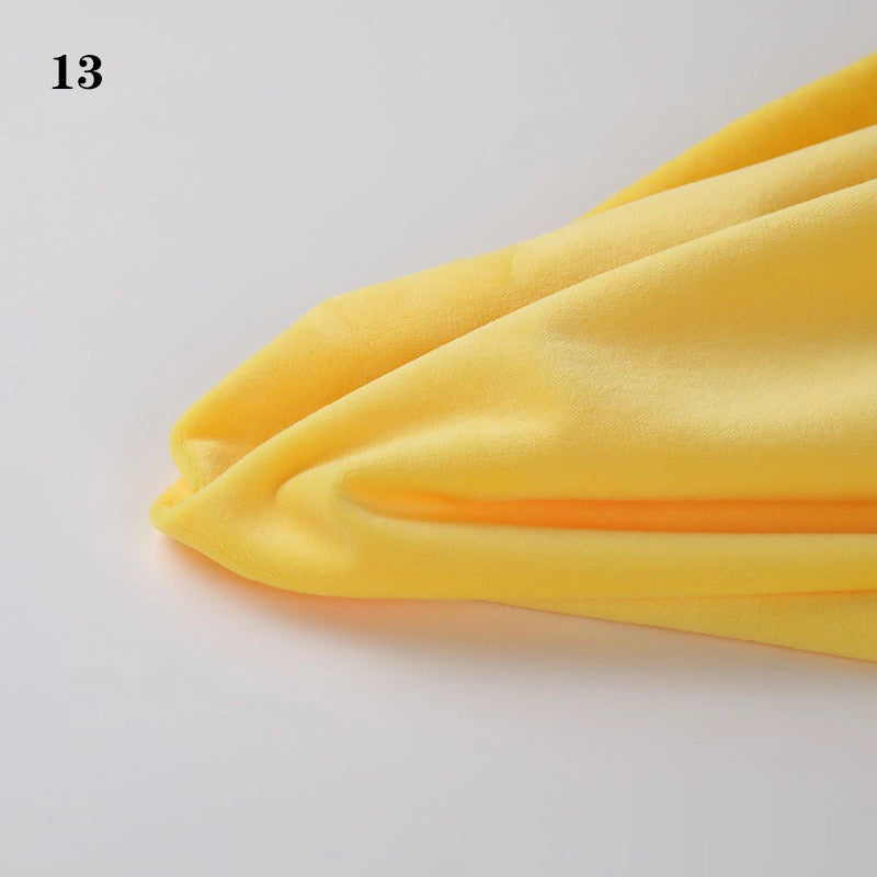 A piece of Soft Minky Fabric By The Yard from Longon Craft, in smooth yellow 1mm Minky Cuddle material for DIY sewing, is laid out on a white surface with the number 13 in the top left corner.