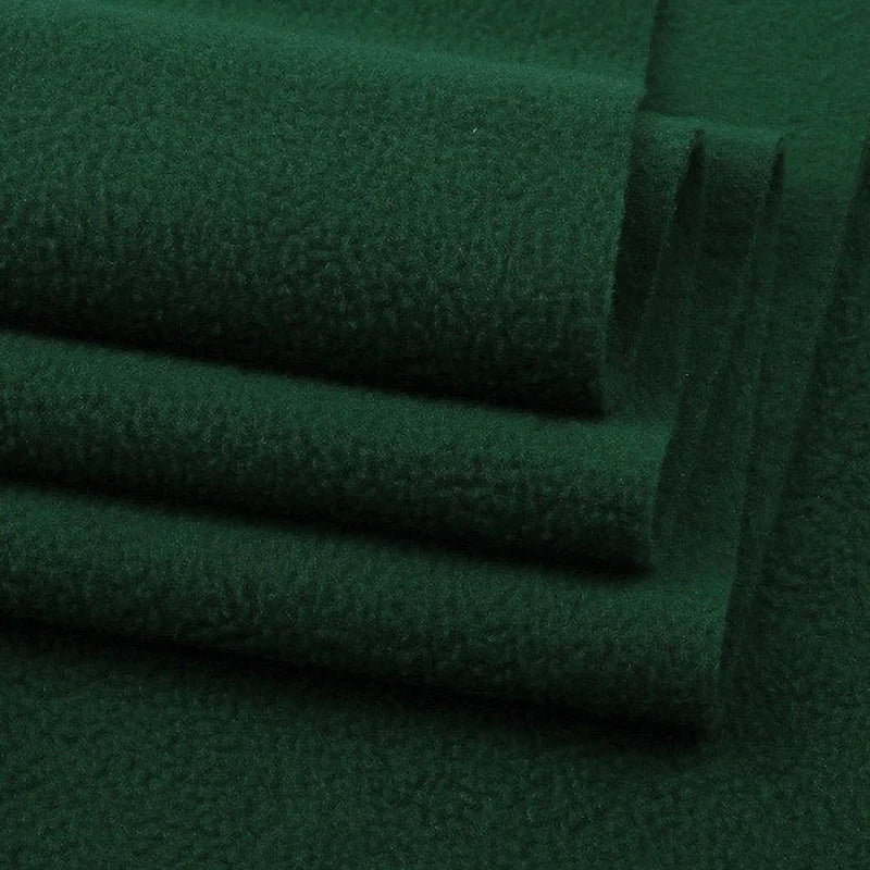 A close-up of Longon Craft’s Solid Polar Fleece Fabric By The Yard shows thick, soft 100% polyester with smooth edges—ideal for DIY sewing, crafts, upholstery, or cozy blankets.