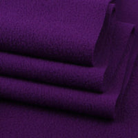 A close-up of several neatly folded pieces of Longon Craft Solid Polar Fleece Fabric By The Yard, 100% polyester and thick plain texture—ideal for DIY sewing, crafts, or cozy upholstery projects.