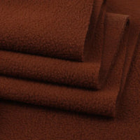 A close-up of folded Solid Polar Fleece Fabric by the yard from Longon Craft, a thick, plain 100% polyester fabric—ideal for cozy blankets, DIY sewing, crafts, or upholstery projects.