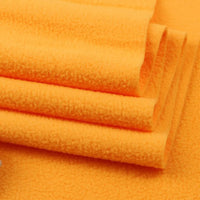 Close-up of Longon Craft Solid Polar Fleece Fabric by the Yard—thick, plain, 100% polyester with a soft, plush texture—perfect for cozy blankets, DIY sewing, crafts, and upholstery projects.