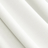 Close-up of Longan Craft's Solid Color Modal Jersey Fabric By The Yard, a breathable cotton spandex jersey textile ideal for sleepwear, shown in smooth white with gentle diagonal folds and subtle texture.